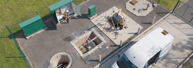Birds eye photo of an adoptable pumping station and two maintenance operativess.