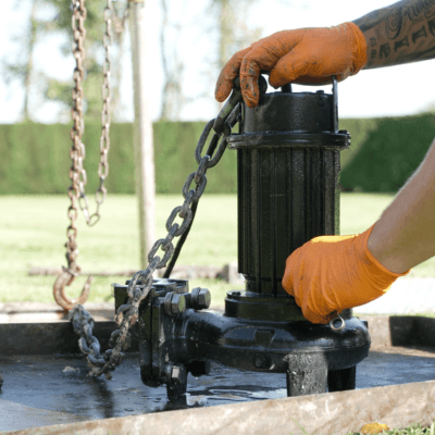 The back of a T-T Service van driving down a country lane on a sunny day towards an emergency breakdown callout.