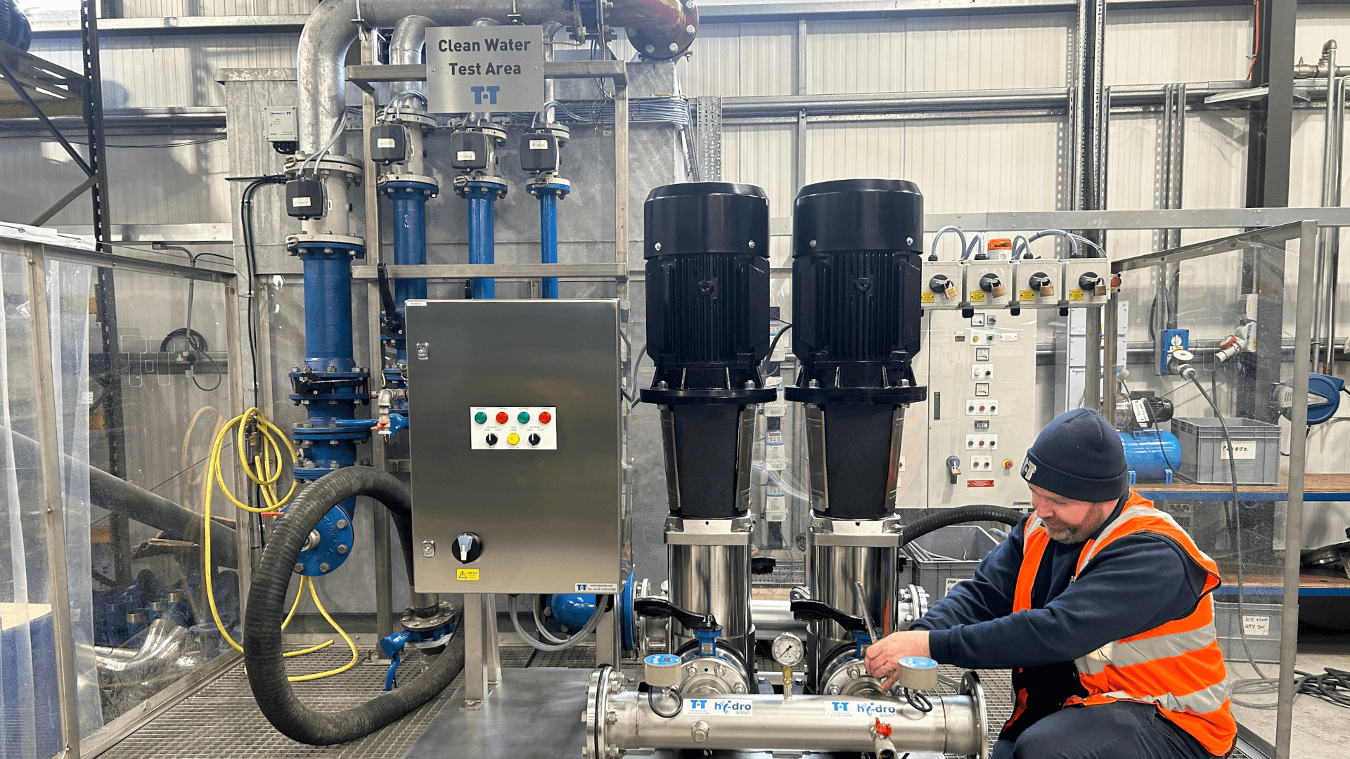 Engineer working on a booster set on clean water test rig.