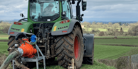 Cri-Man PTH umbilical pump mounted on a tractor.