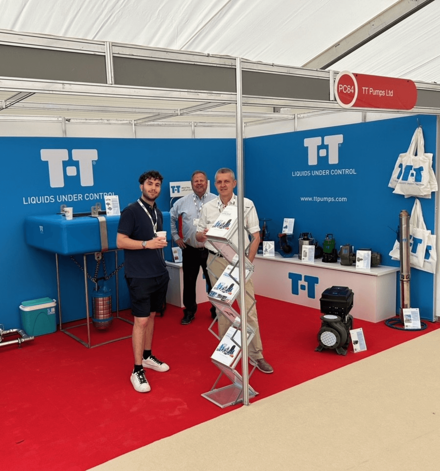 T-T and SAER Elettropompe representatives at the T-T stand.