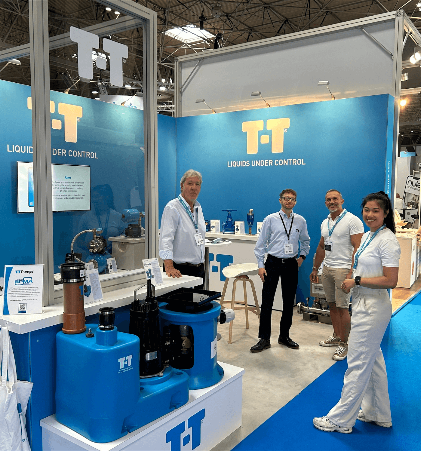 T-T sales representatives at the T-T display stand.